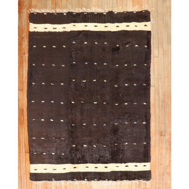 An early 20th century one of a kind Turkish Sirt rug woven with mohair wool. These pieces are inspired by traditional...