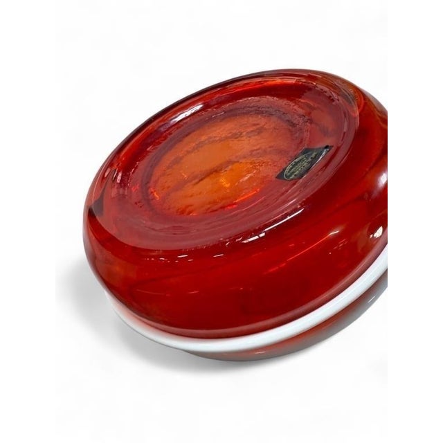 A monumental Makora Kronso art glass red vase made in Poland. This gorgeous vase has a free flowing form, rising up from...