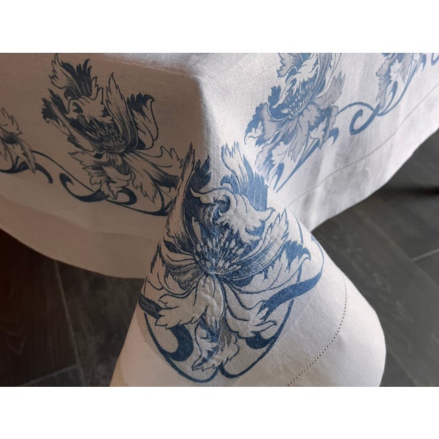 Vintage from 1920’s damask tablecloth with blue floral design around the boarders. Monogrammed MS. Freshly washed and...