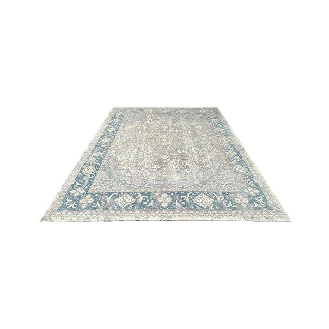 Immerse your space in the sophisticated charm of this magnificent 8x10 Transitional area rug. Handwoven by skilled...