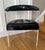 The MCM Lucite Barrel Tub Chair with a Black Patent Leather Backrest and Floating Seat is a stylish and unique piece of...
