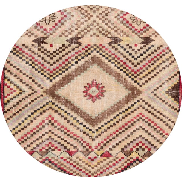 Beautiful Vintage Turkish rug, hand-knotted wool with a multi-color field in a gorgeous all-over geometric design. This...