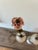 Lovely pair of vintage Marbro lamps. Beautiful soft pink porcelain roses and greenery on a soft white backround. Note that...