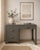A beautifully refinished vintage waterfall writing desk featuring elegant rounded edges, distinctive fluted detailing, and...