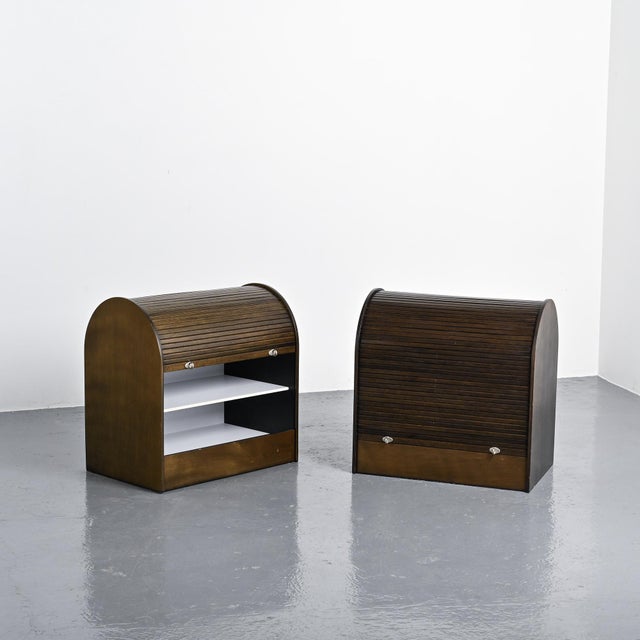 Pair of louvered storage units designed by Klaus Vogt for Thut Möbel, Switzerland, circa 1970. Compact in design, they...