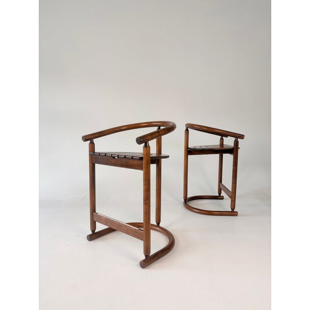 Produced by luxury German manufacturer Allmilmö, this set of four architectural counter stools is a masterclass in Post-...
