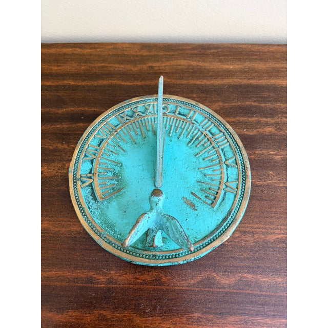 A stunning vintage iron verdigris garden sundial featuring a charming hummingbird USA, Late 20th Century Measures: 6.5"W x...