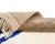 Artistic hand-knotted wool rug featuring an Ivory base with abstract Misty Taupe and Blue patterns, offering a captivating...