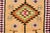 Hand-knotted in wool, originating circa 1950-1959, this 3x11 vintage Turkish runner features a warm beige field adorned...