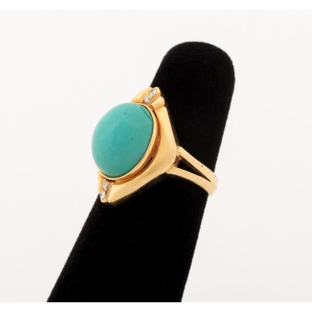 14K Yellow Gold Turquoise Diamond Ring, featuring one bezel set oval turquoise cabochon weighing approx. 5.25 carats,...