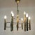 Rare nine-light chandelier from the "Modulo series" made by Profili Industria Lampadari, Spa. Rome, 1960s. This brass &...