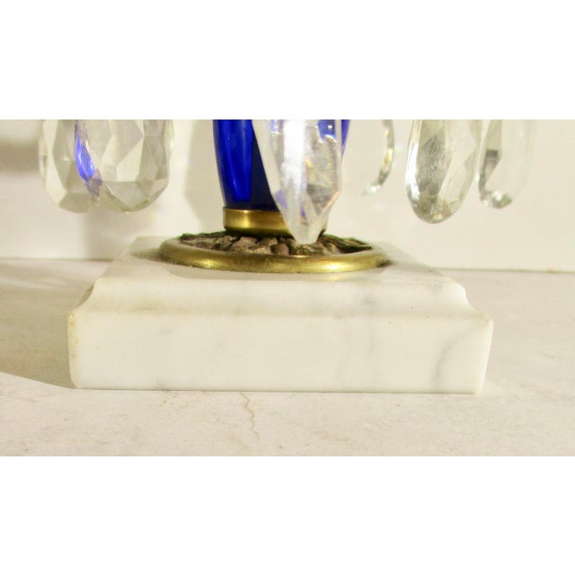 Swedish style from the 20's or 30's with dark blue crystal elements and clear teardrops. Central spire with branching arms...