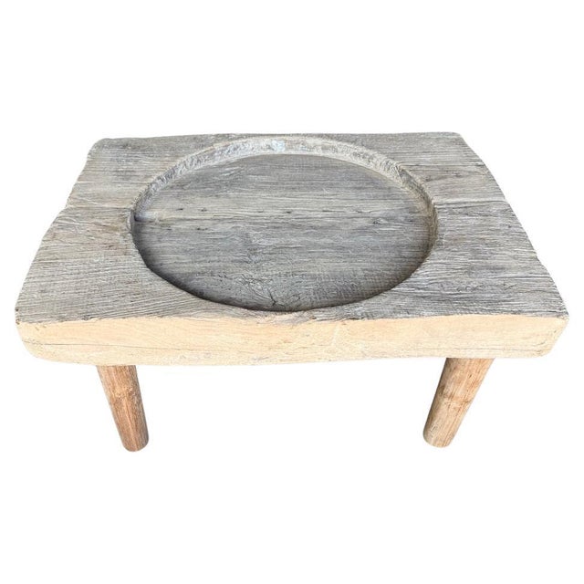 A mix of the old with the new. We added minimalist cylinder legs to this century old four inch thick coffee grinder top....