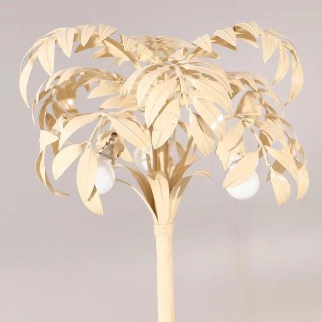 Introducing the cream white palm tree floor lamp, a stunning piece that beautifully captures the essence of Hollywood...