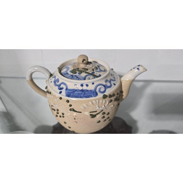 This is an authentic 20th-century antique Japanese Moriage ceramic teapot, crafted during the late Meiji to Taisho era. It...