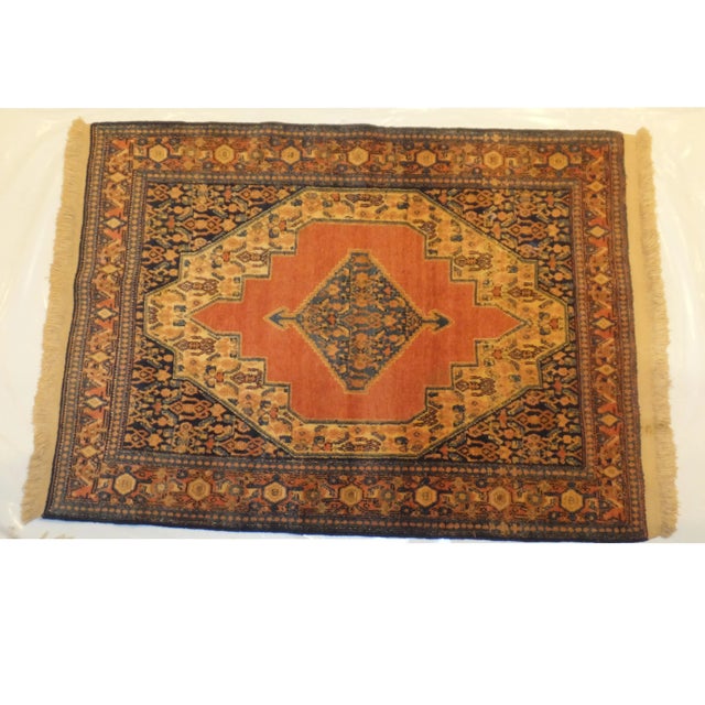 This handmade, fine Persian Senneh rug is sure to add sophistication and an ethnic elegance to any space. It has a plush...