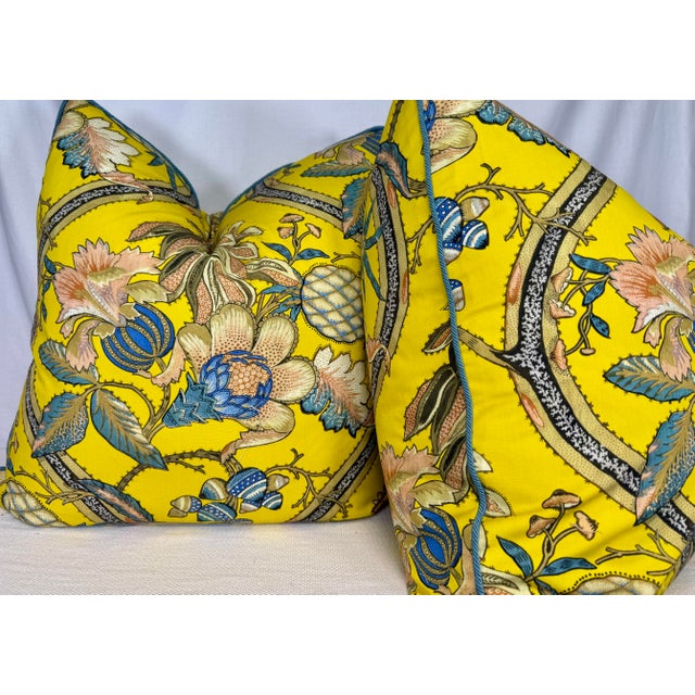 Custom pair of 24” pillows covered in Pierre Frey “A La Table Du Roi” fabric in color canari. These pillows are corded in...