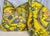 Custom pair of 24” pillows covered in Pierre Frey “A La Table Du Roi” fabric in color canari. These pillows are corded in...