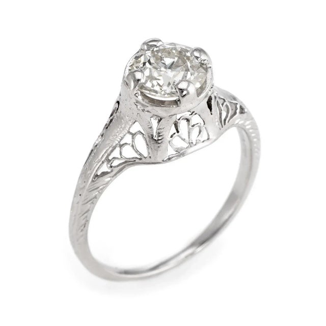 Elegant & finely detailed Art Deco era ring (circa 1920s to 1930s), crafted in 14 karat white gold. Centrally mounted...