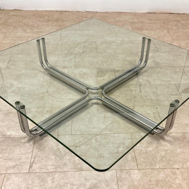 This iconic square coffee table, model 784, was designed by renowned Italian architect and designer Gianfranco Frattini...