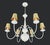 Cottage style chandelier made of a white steel frame with six arms, each topped with yellow and green checkered fabric...