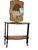A striking Italian-style console table and matching mirror set with sculptural lines, rich black accents, and warm gold-...