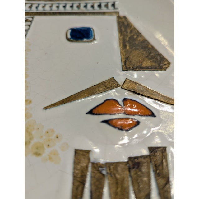 Vintage European ceramic wall plaque featuring a stylized king in bold glaze and geometric relief. Excellent condition...