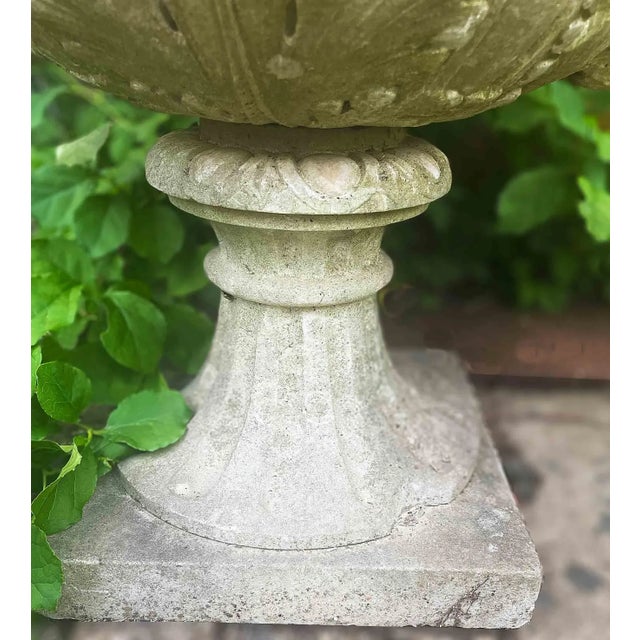 Antique, mid 19th century antique carved marble urn with grapevine and lion's head design. Carved design continues under...