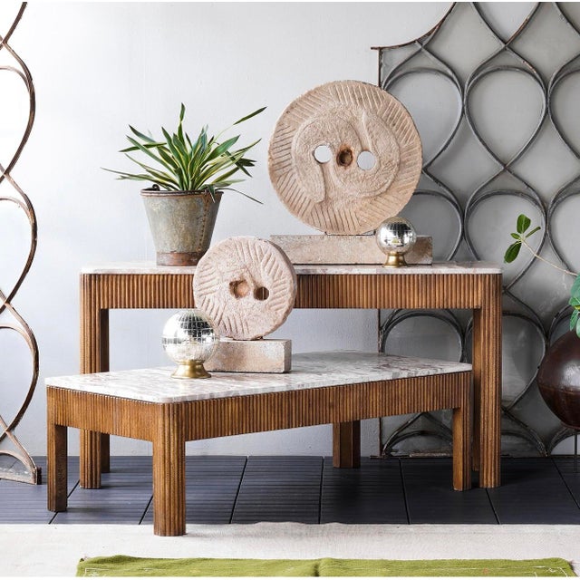 Mango wood slats atop a solid frame. The wood is finished with plastic paint, providing a deep caramel hue. The textured...