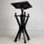 A charming early 20th-century English side table, finely crafted from ebonised wood and distinguished by its unusually...