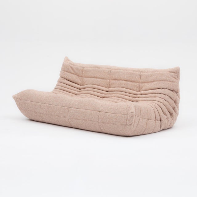 An original vintage Ligne Roset Togo 3-seater designed by Michel Ducaroy in 1973 and sourced in Europe. Restored by our...