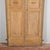 This charming antique double door, dating back to the late 18th century, embodies the understated yet functional style of...