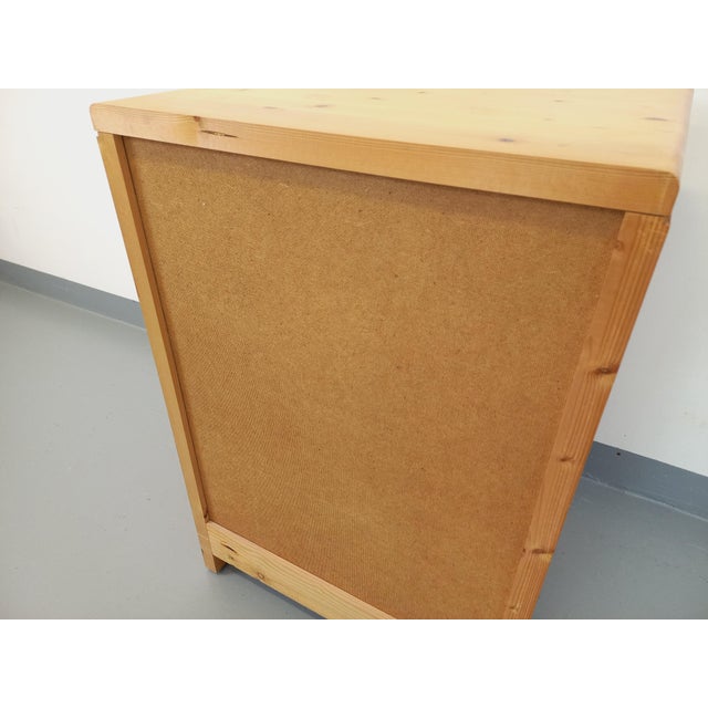 Vintage storage unit from the 60s and 70s, in pine, by Charlotte Perriand for Les Arcs, a sliding drawer and a door with 2...