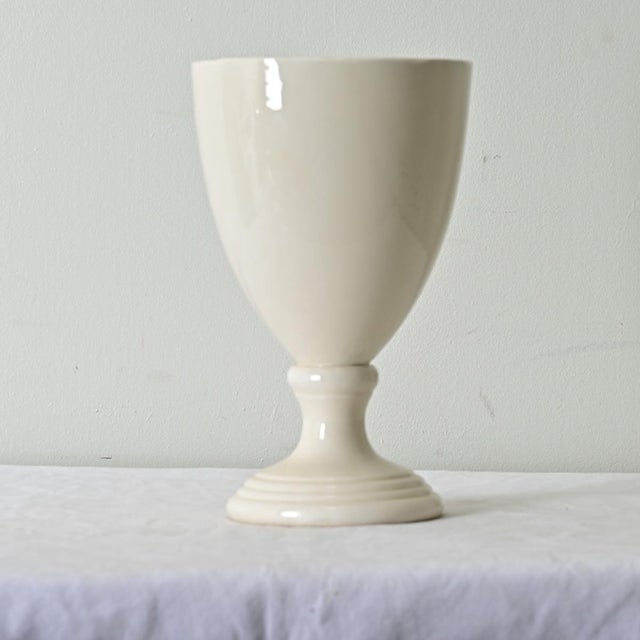 Dimensions: 11 ¼” H x 7” W x 7” D Tall and slender ironstone urn made in 19th century England. The expertly crafted...