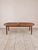 A distinctive antique European country walnut table with a beautifully worn surface and unexpected details. The elongated...