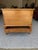 Solid cherry mule chest featuring a single lower drawer and turned arrow point legs. Hinged top allows for storing...