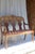 A beautifully carved antique walnut settee in the Empire / Biedermeier tradition, featuring the graceful proportions and...