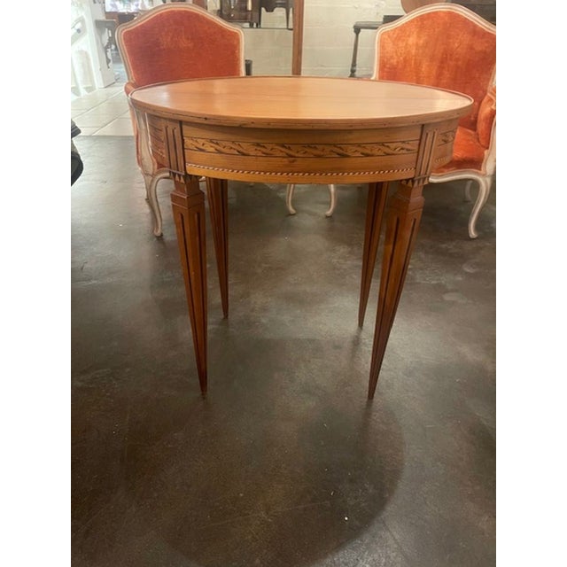 The 19th c. Italian Inlaid Walnut Side Table is a piece that exudes elegance and craftsmanship. Made from high-quality...