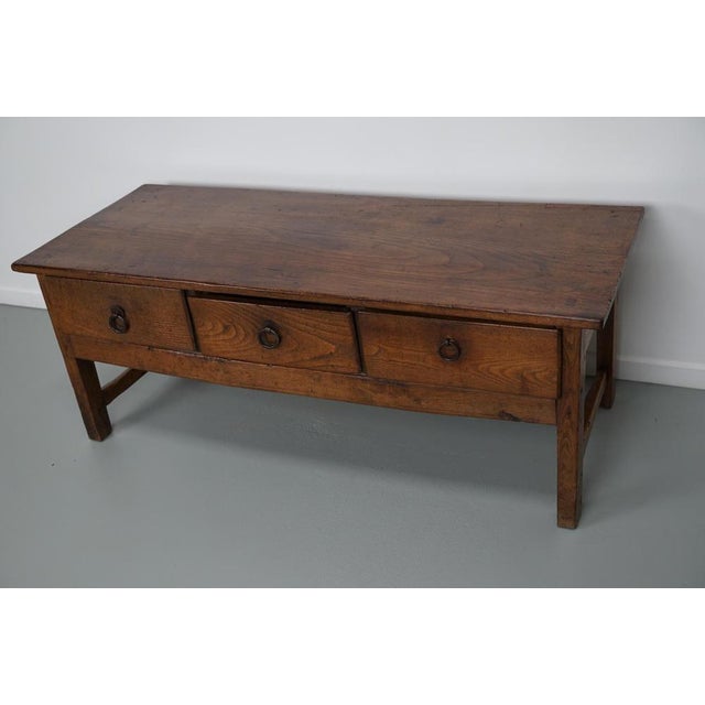 This coffee table was converted from an old 18th century chestnut farmhouse prepping table. It retained a very nice patina...