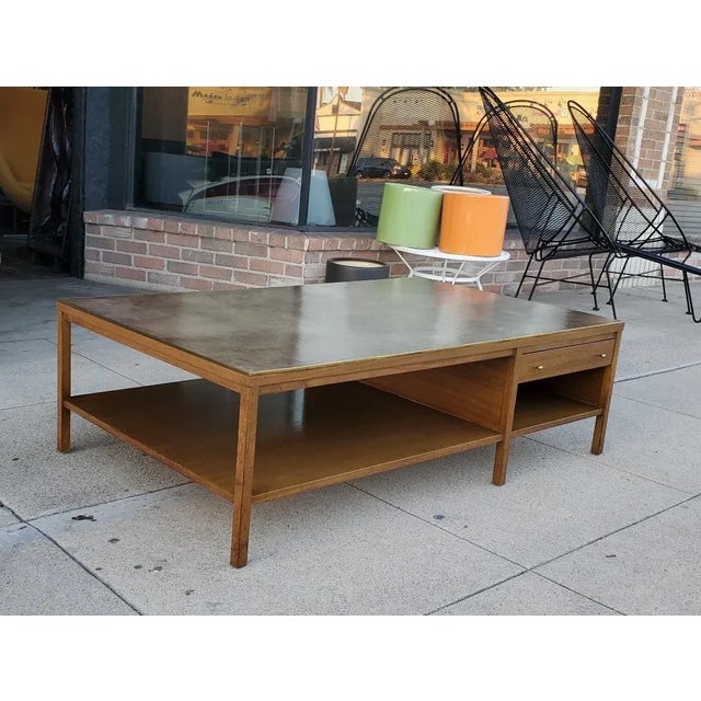 Rare 1950s Paul McCobb Leather Top Coffee Table. Gorgeous Philippine Mahogany, Brass Trim, Tear Drop Brass Pulls, Pull Out...