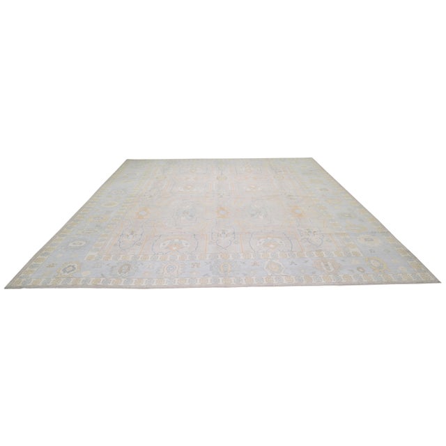 Turkish hand woven Oushak rug with allover design and silky soft texture.
