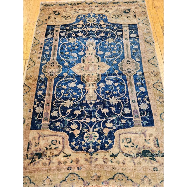This exquisite early 20th century Turkish Oushak area rug showcases a rare botanical pattern of great visual refinement...