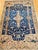This exquisite early 20th century Turkish Oushak area rug showcases a rare botanical pattern of great visual refinement...