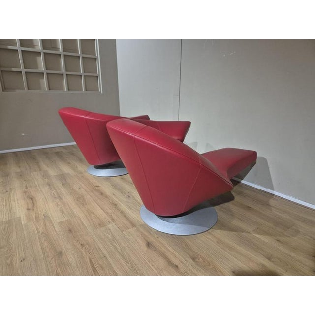 Brand: Leolux Model: Parabolica Color: Red Condition: Mint condition Armchair dimensions Width: 100cm Depth: 150cm Height:...