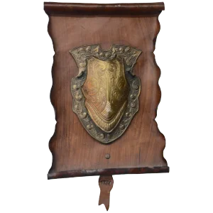 Vintage Bronze Shield on Rustic Leather Scroll Wall Hanging