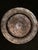 This plate is a splendid example of the ancient art of Ghalamzani. It has a hand engraved intricate floral and bird motif....