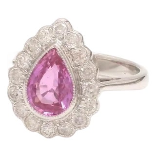 Natural 1.80 cts pink sapphire & 0.65 cts diamond ring in 18k gold For Sale
