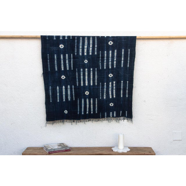 Hand-woven by master weavers of the Mossi and Dioula traditions in Burkina Faso, West Africa, these vintage textiles are...