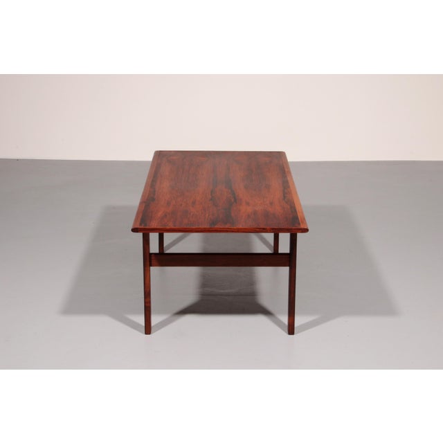 Step back into the golden age of Danish design with this classic rectangular coffee table from the Capella series, crafted...