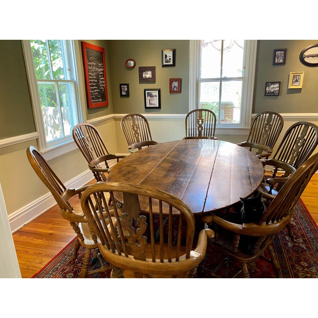 8 x 5 foot oval gate leg drop leaf dining table seats eight. You can drop one side to position table against wall, or both...